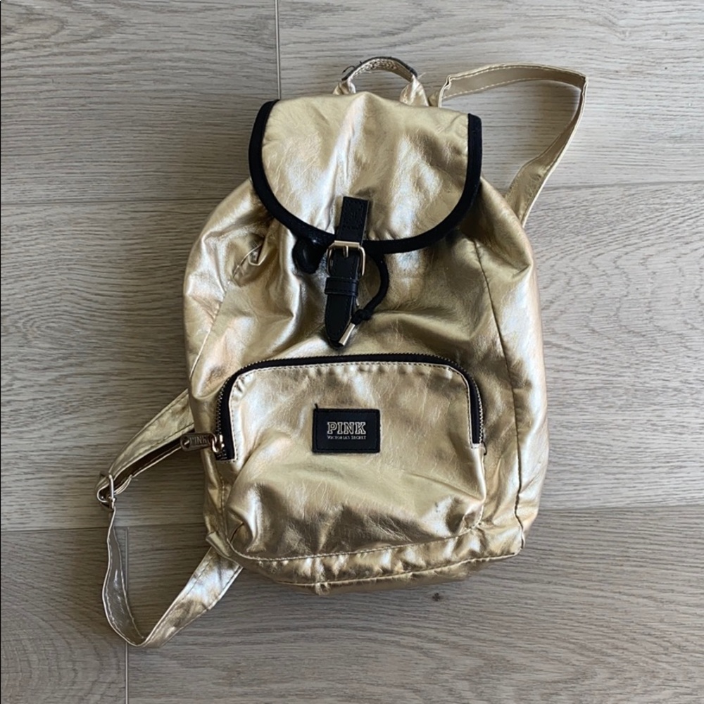 Pink by Victoria Secret Gold back pack.